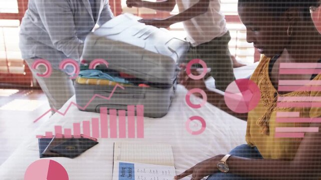 Parents and son packing travel case after mom consulting tablet, while pink AR charts analyzing