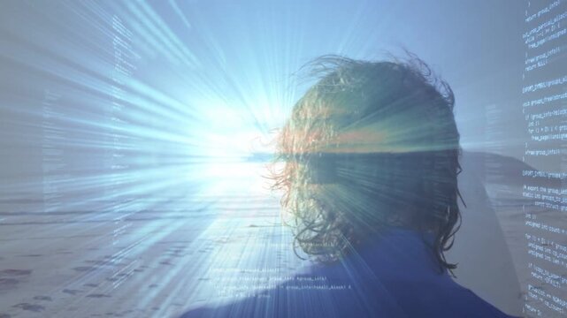 Sun pulsing horizon, man standing beach turning head observing sun while tech beams sweeping head