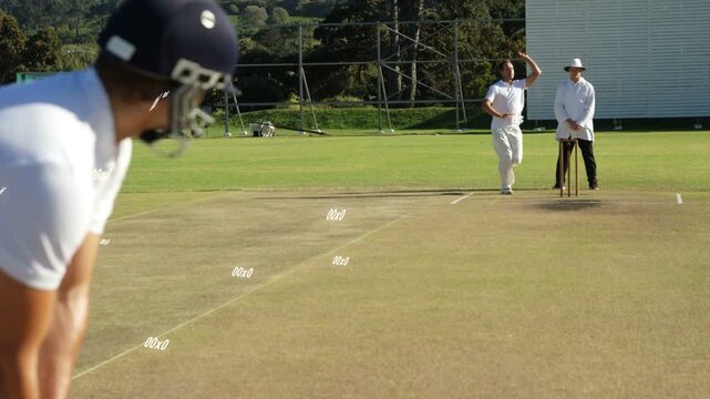 Helmeted batsman crouched watching bowler running and releasing cricket ball to defend stumps