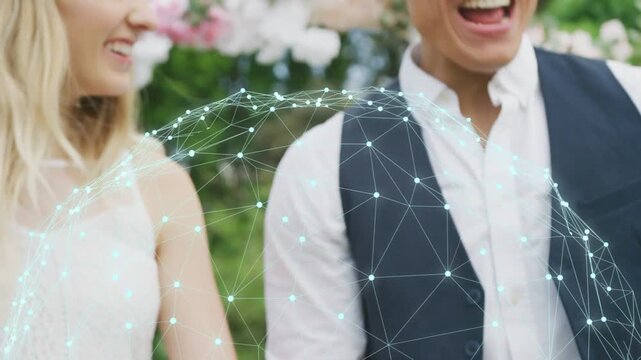 Couple holding hands, camera pulling back, animated network arcing over ring, marking tech wedding