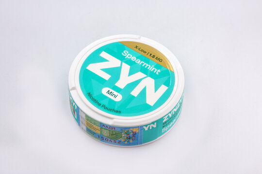 ZYN nicotine pouches spearmint mini low strength container closeup.