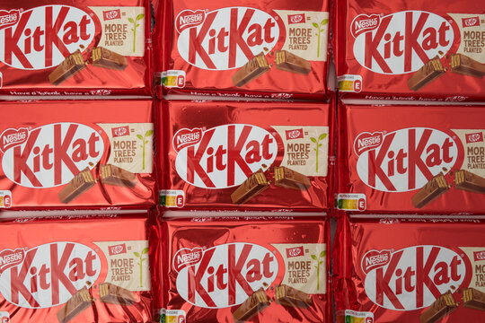Moscow, Russia - April 22, 2026. Delicious Kit Kat Candy Bars in Bright Red Packaging Showcasing Their Tempting Layers and Crunch