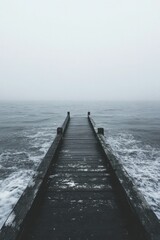 Fototapeta premium Serene Foggy Pier Leading to Open Sea