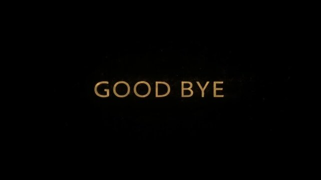 Slow motion static shot of gold text dissolving and particles scattering on black background centered goodbye typography
