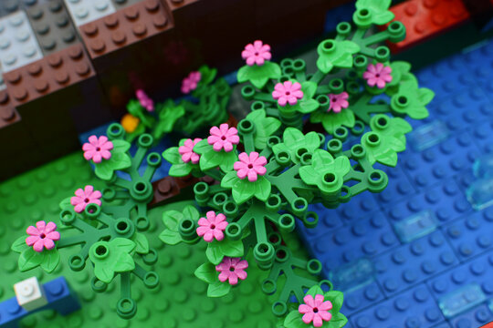 
A floral background made of colorful Lego bricks. Lego flowers