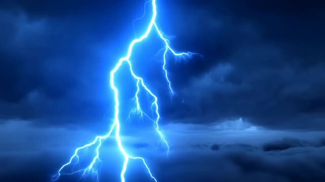 Slow motion static close up of lightning bolt striking through storm clouds over cloud layer and horizon in turbulent night sky