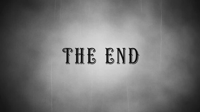 Static shot of vintage film title card reading the end centered on textured grayscale backdrop with film grain scratches vignette and subtle flicker