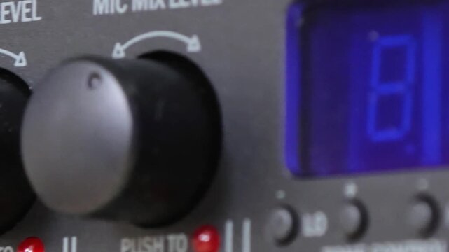 Front control panel of the audio amplifier with level controls and display