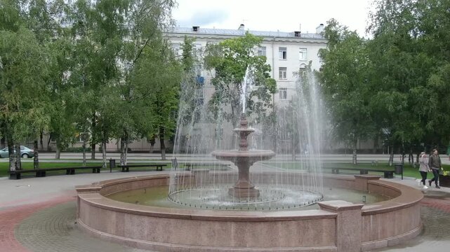 Aerial rotation around park fountain in Khimki