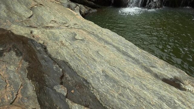 Rugged rock faces frame the cascading water. Vucjanka River Canyon, Serbia.