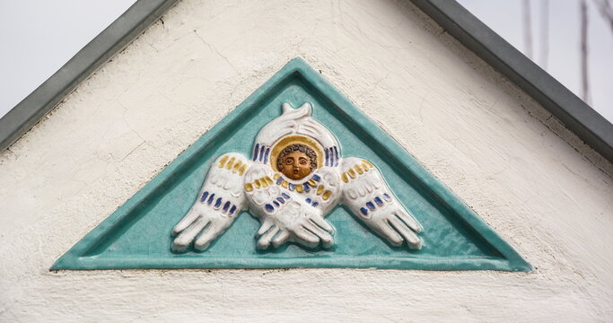 Ancient majolica tile with the image of a six-winged seraphim