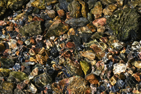 Stones and pebbles in a stream of water