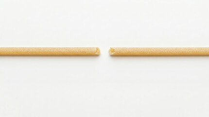 Obraz premium broken spaghetti strand minimal concept separation and tension on white background