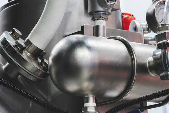 Industrial  concept. equipment of the boiler-house, - valves, tubes, pressure gauges, thermometer. Close up of manometer, pipe, flow meter, water pumps and valves of heating system in a boiler room.