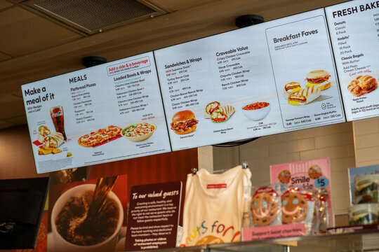 View of Tim Hortons digital menu board inside cafe. Toronto, Canada - April 23, 2026.