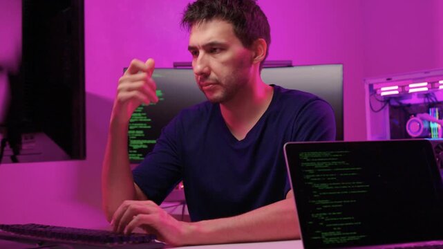 Solo software engineer working through technical issues late at night. Dedicated coder in dim lighting diagnosing problems on open computer case with intense concentration