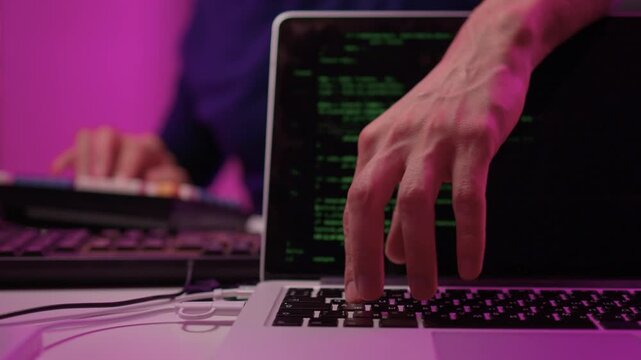 Solo software engineer working through technical issues late at night. Dedicated coder in dim lighting diagnosing problems on open computer case with intense concentration