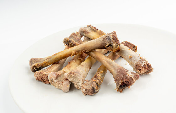Chicken Leftovers Isolated, Cleanly Gnawed Bones, Gnawed Bare Bones after Dinner, Eaten Clean Lunch