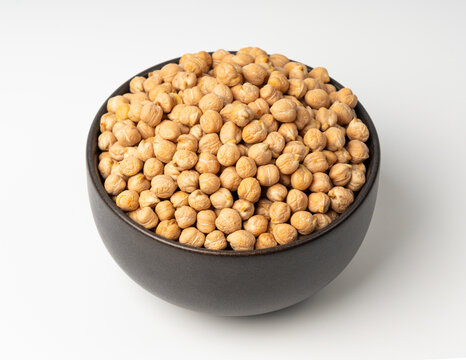 Chickpea, chick pea pile, dry Cicer arietinum fruits, raw Bengal gram legume, garbanzo beans