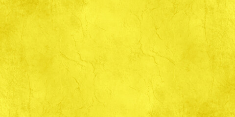 A textured, vibrant yellow surface fills the frame, creating a striking and visually engaging background, full of subtle detail, that evokes feelings of warmth, energy, and creativity. © Creative Lis