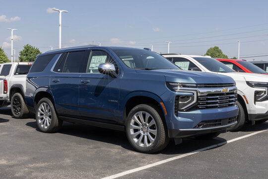 Chevrolet Tahoe 4WD Premier Full-Size SUV at a dealership. Chevy offers the Tahoe with a 5.3L Ecotec3 V8 engine. MY:2026