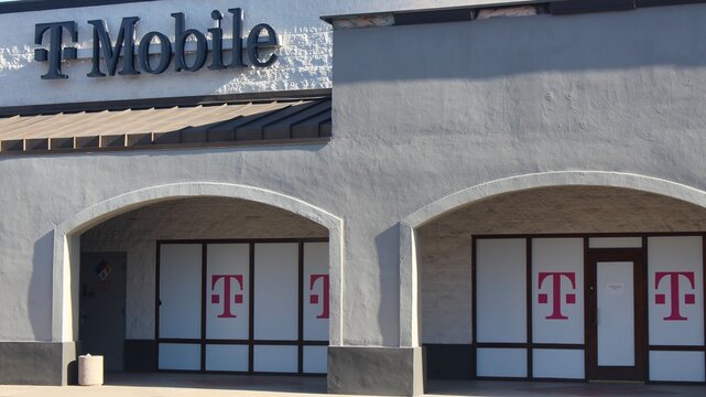 T-Mobile retail store with signage and window logos
