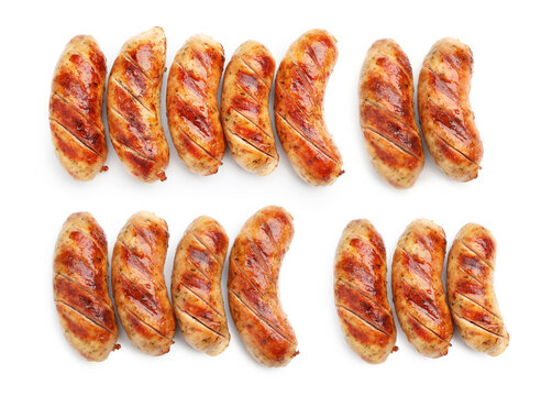 Tasty grilled sausages isolated on white, set. Top view