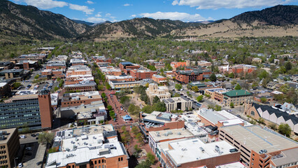 Pearl street mall, boulder, on a clear day with flatiron mountains in distance  © Obsidia Media