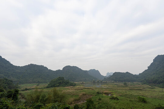 serene and misty atmosphere of a rural valley at Thung Nham