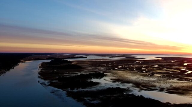 Drone clip of slow ascension over the intercostal waterway in South Carolina just before sunrise.