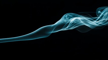 Fototapeta premium Ethereal Blue Smoke Flowing Gracefully Against a Black Background, Captivating Visual of Energy and Movement in an Abstract Art Style