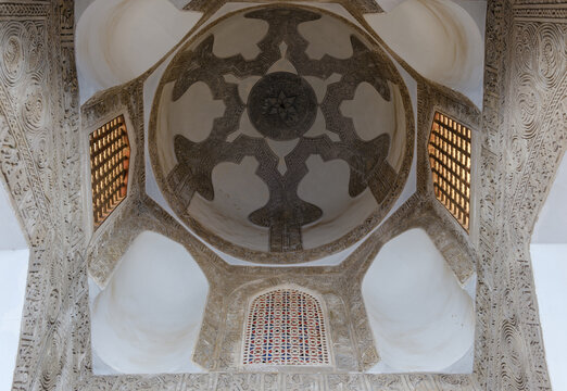 View of the intricate interior dome of Al-Azhar Mosque featuring detailed stone carvings and geometric patterns Cairo, Egypt.