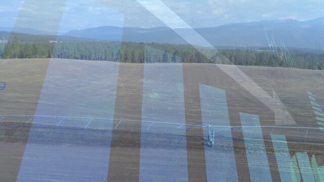 Timer starting, pivot span moving right across fallow field for irrigating, overlay showing data