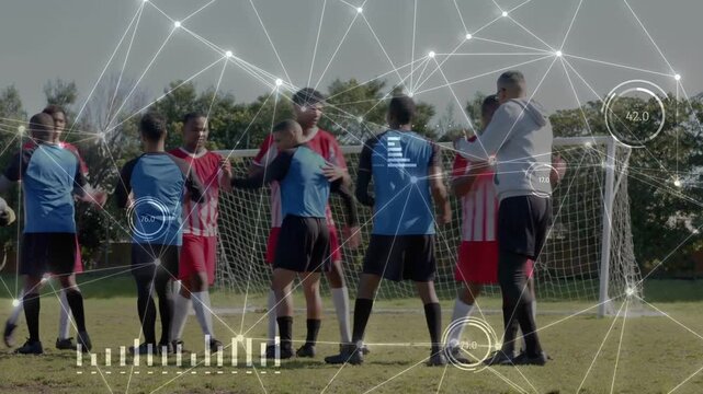 Coach directing players forming defensive wall defending goal, sports HUD overlaying players