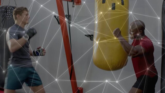Coach holding yellow bag, kicker stepping forward front-kicking, net overlay showing impact fitness