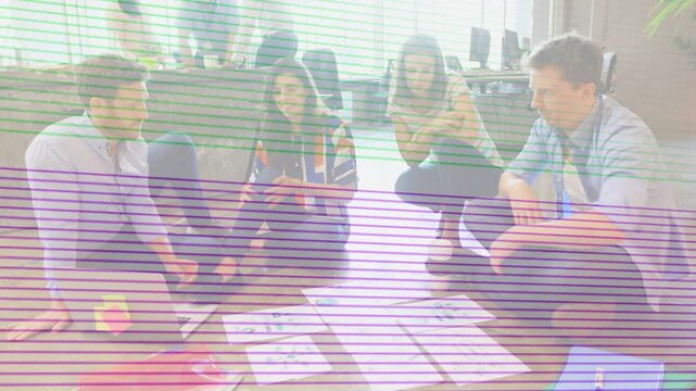 Team holding design review, lead pointing driving layout edits while deciding, scanlines obscuring