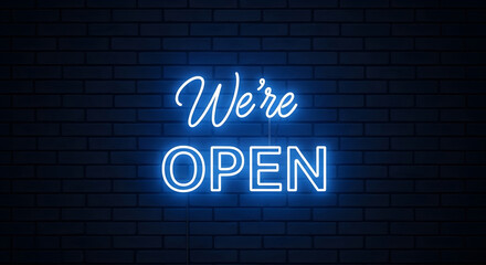 Obraz premium Vibrant blue neon 'We're Open' sign illuminating a dark brick wall, creating an inviting glow for businesses, retail stores, cafes, and shops, signaling readiness for customers.
