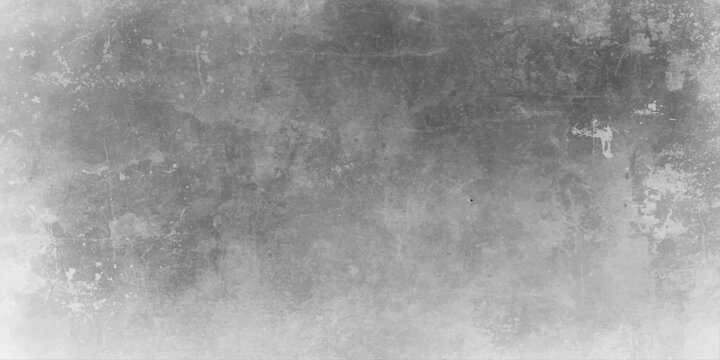 A dark aged black and white grunge wall background featuring a rough textured concrete surface with a vintage gray stone pattern and old dirty paper art design