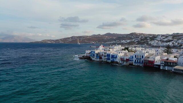 Mykonos island traditional whitewashed homes, Little Venice on the Aegean seashore, Aerial view.