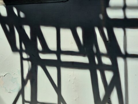 Abstract Geometric Shadows on a White Wall