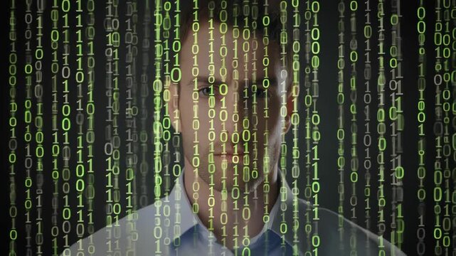 Man's face layered over green computer code streams