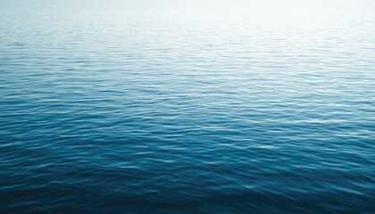 Obraz premium Calm Ocean Surface Ripples for Tranquil Backgrounds in Presentations, Websites, and Meditative Content