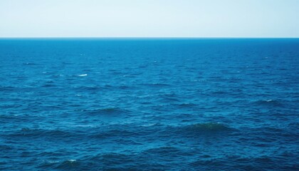 Fototapeta premium Vast ocean expanse, tranquil waters perfect for peaceful contemplation, travel inspiration, and nature presentations