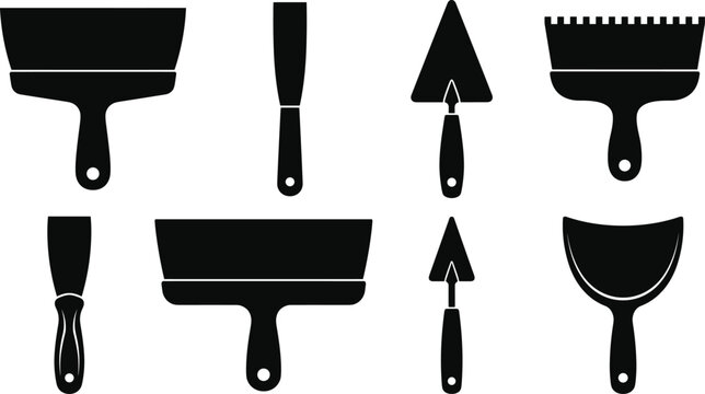 Collection of various construction spatula and trowel silhouettes including putty knives and notched scrapers isolated on white background for masonry and renovation graphic designs.