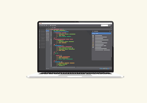 A laptop displaying coding software with colorful code on the screen