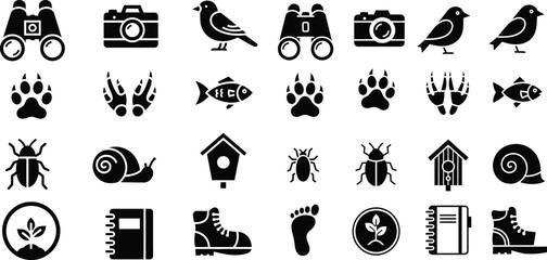 Collection of black silhouette icons animals objects and nature elements © monoara begum