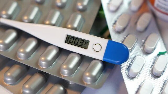 Digital Thermometer with Fever Reading and Blister Pack Pills
