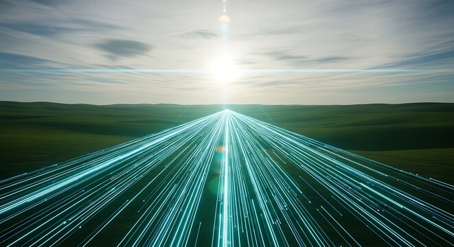 Aerial view of futuristic light trails leading towards a bright sunrise landscape