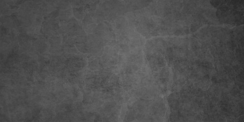 Dark charcoal grunge wall texture background. Dark black rough grunge surface with smoke edge. Black texture chalk board and black board. © MDFAIMIDULISLAM