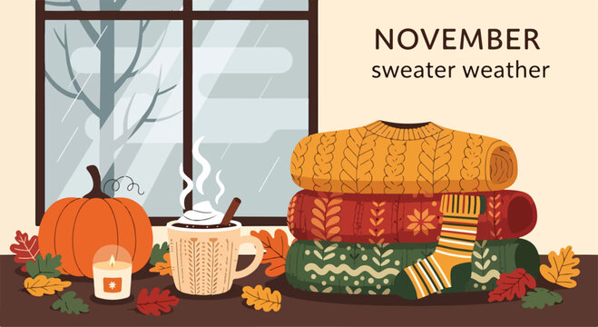 Cozy autumn scene with sweaters and hot drink